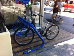 Coat hanger style bike rack